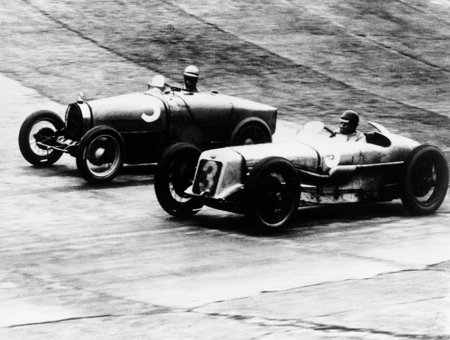A Delage and a Bugatti race at the British Grand Prix, 1927. Getty Images