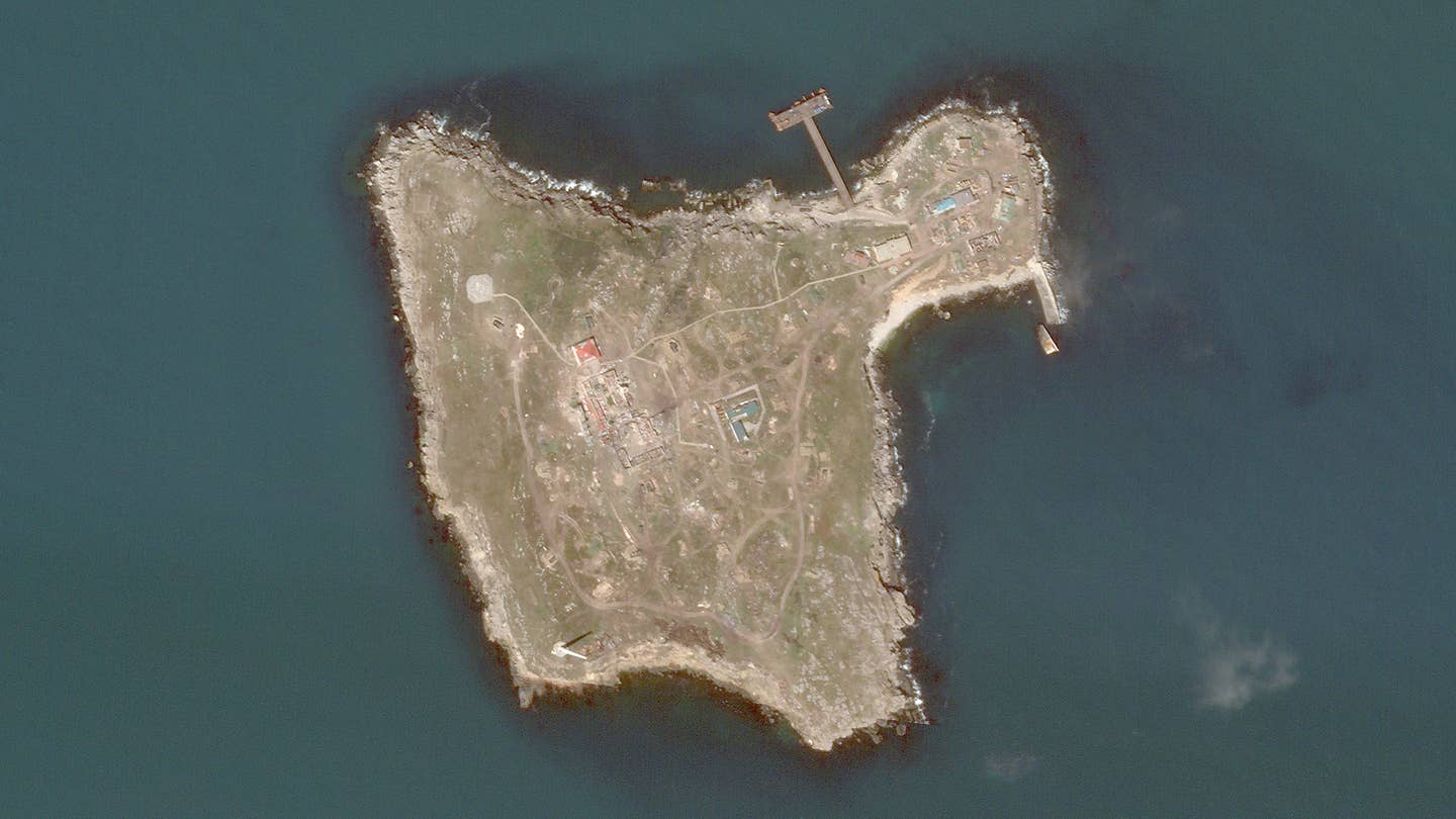 Snake Island as it appeared on June 10, with multiple entrenched air defense vehicles seen around the island. PHOTO © 2022 PLANET LABS INC. ALL RIGHTS RESERVED. REPRINTED BY PERMISSION.