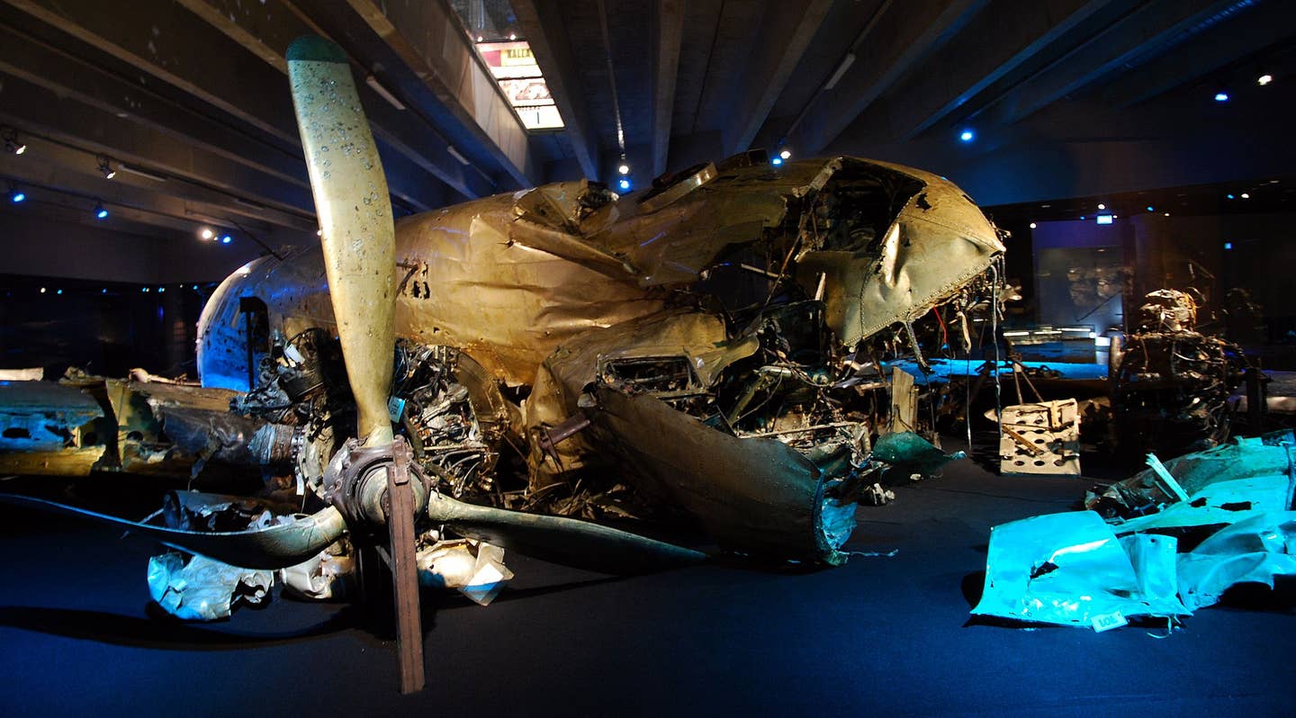 Wreckage of the Tp 79 (C-47), including the starboard propeller and forward fuselage, on display in the museum at Linköping, Sweden. <em>Alex Nordstrom/Wikimedia Commons</em>