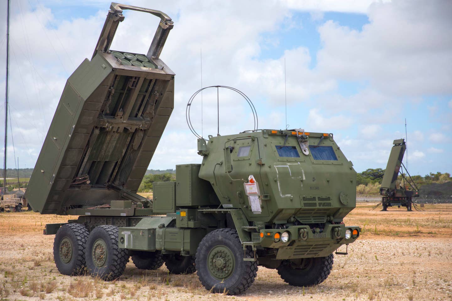 Unlike the M270, the HIMARS is on a wheeled chassis and can only have one ammunition pod loaded onto it at a time, as opposed to two with the M270. (U.S. Marine Corps photo by Cpl. Tyler Harmon)