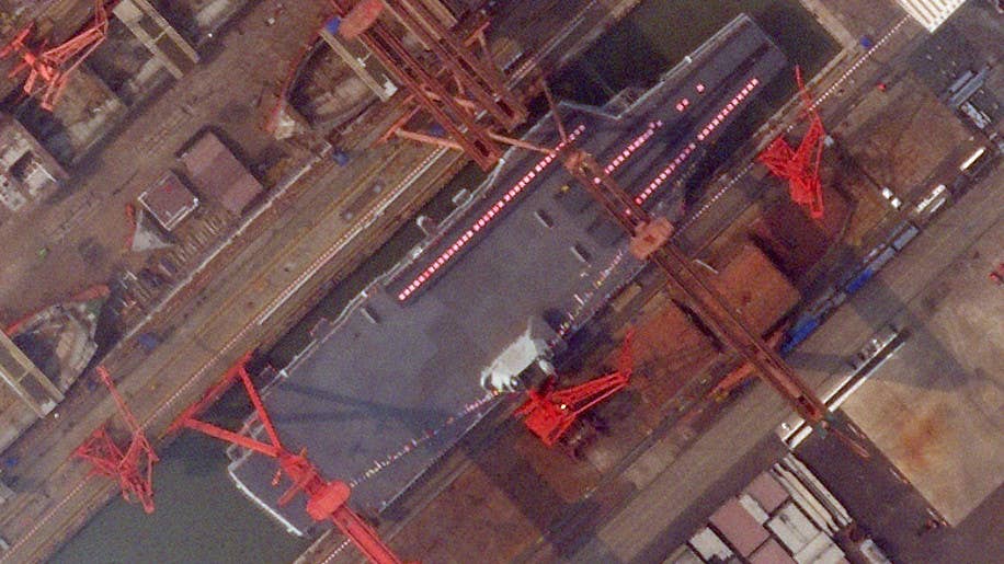 The decorations on the Type 003 carrier are clearly visible in the June 14 satellite image. <em>PHOTO © 2022 PLANET LABS INC. ALL RIGHTS RESERVED. REPRINTED BY PERMISSION</em>