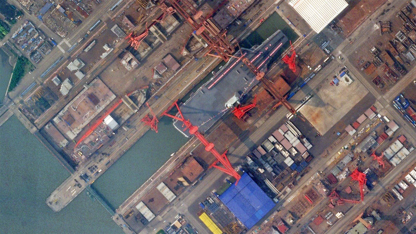 A satellite image showing China's still-under-construction Type 003 aircraft carrier at the Jiangnan Shipyard in Shanghai on June 14, 2022.