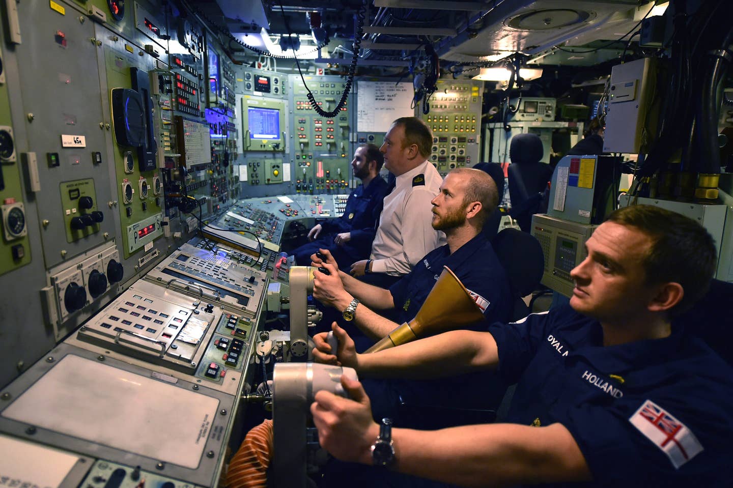 Royal Navy personnel in the control room on HMS <em>Vigilant</em>, one of the four <em>Vanguard</em> class submarines, in 2016. <em>Photo by Jeff J Mitchell/Getty Images</em>