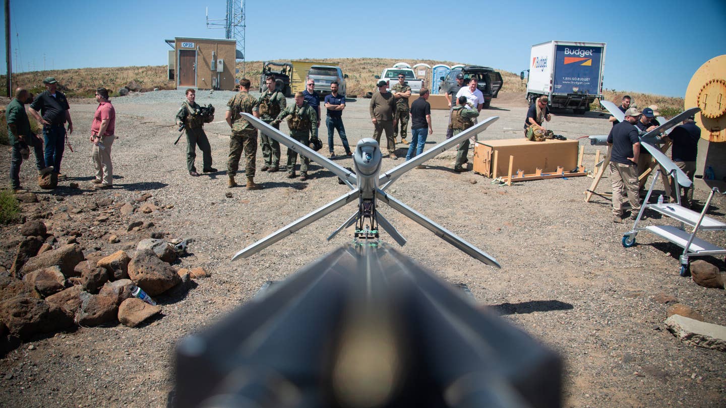 A U.S. Marine Corps Hero-400 loitering munition drone is staged before flight on San Clemente Island, California, on May 25. <em>U.S. Marine Corps photo by Lance Cpl. Daniel Childs</em>