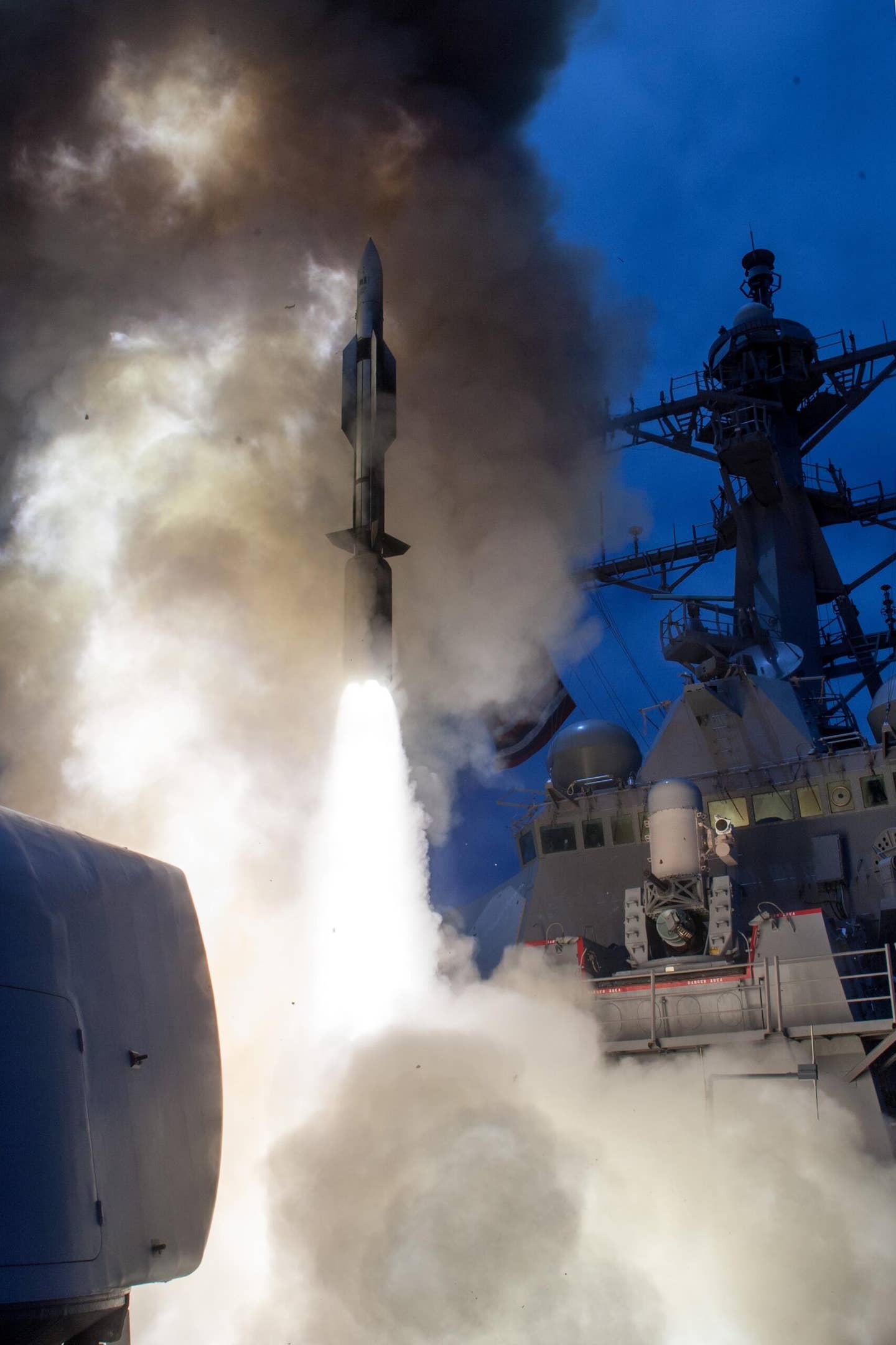 The <em>Arleigh Burke</em> class destroyer USS <em>John Paul Jones</em> (DDG-53) launches a Standard Missile 6 (SM-6) during an earlier live-fire test that took place in the Pacific in 2014. <em>U.S. Navy photo/Released</em>
