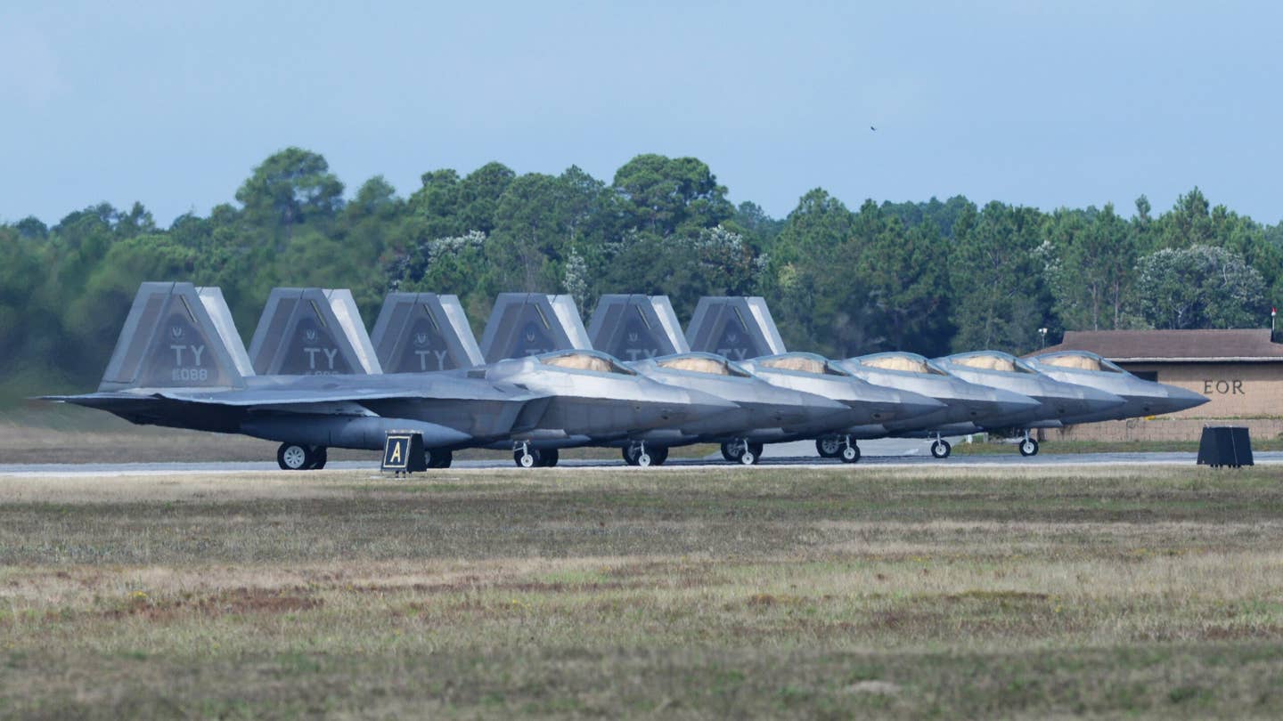 Six 95th Fighter Squadron F-22As line up before takeoff at Tyndall Air Force Base, Florida. <em>U.S. Air Force photo by Senior Airman Sergio Gamboa/Released</em>