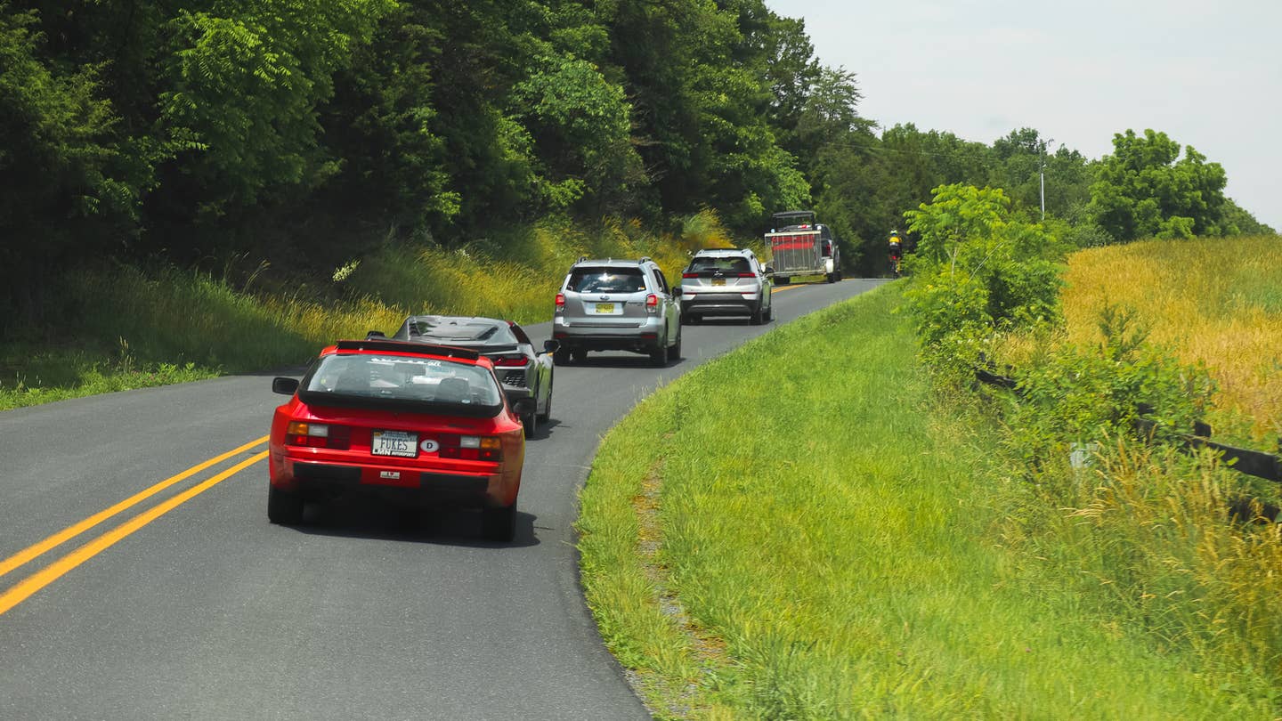 Cars driving through Virginia with Porsche 944 in clear view