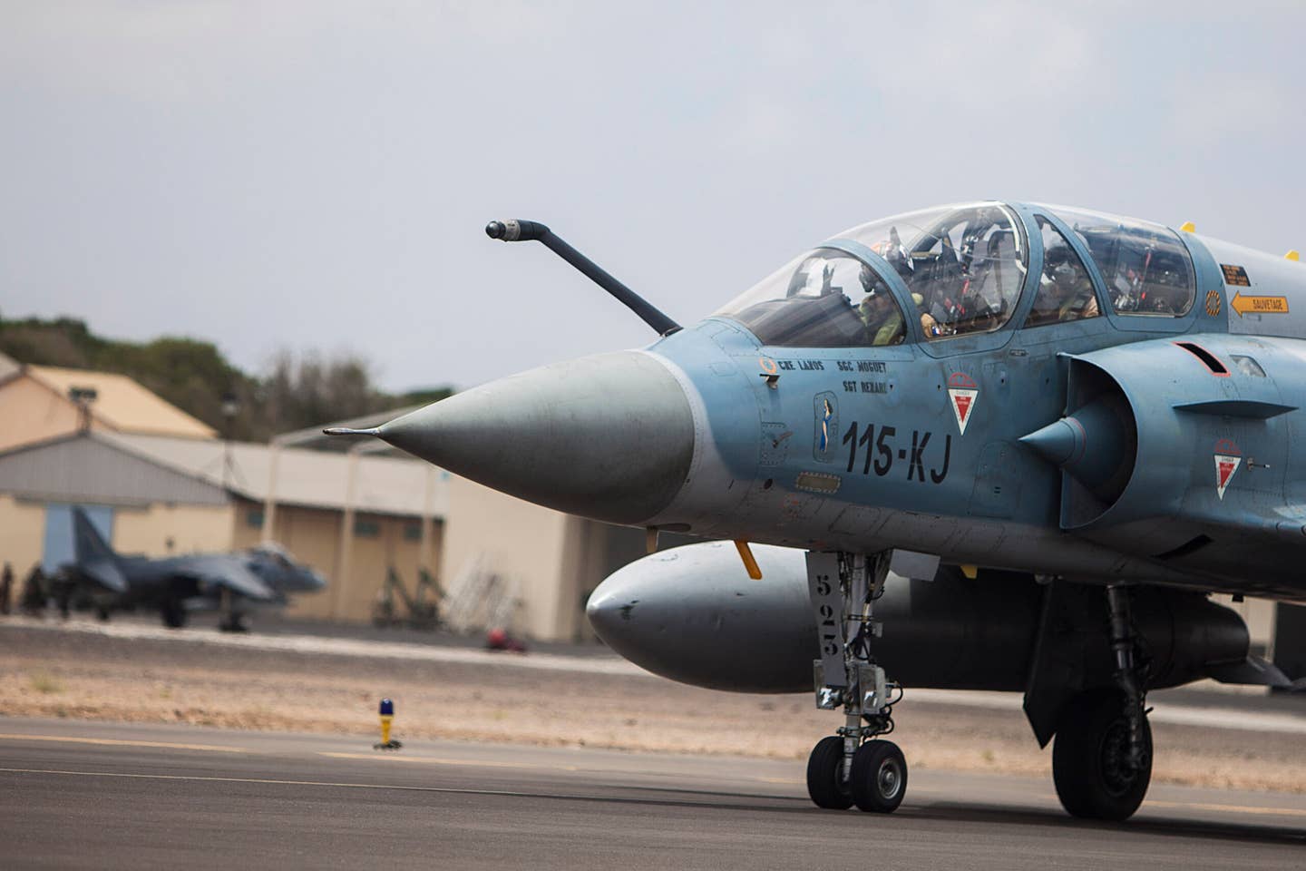 A two-seat Mirage 2000B taxies to the runway in Djibouti during an air-to-air combat exercise with U.S. Marine Corps AV-8Bs. <em>U.S. Marine Corps photo by Sgt. Austin Hazard/Released</em>