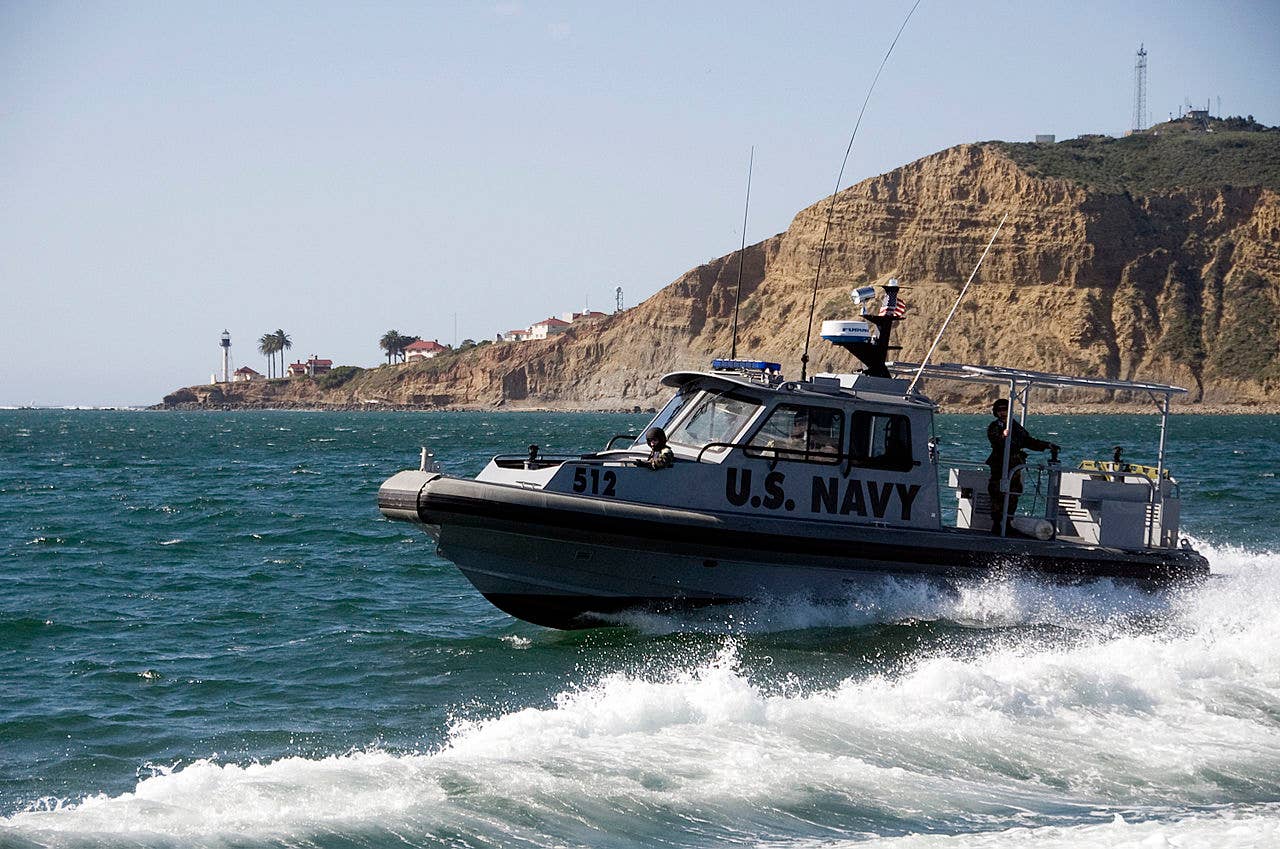 A <em>Sea Ark Dauntless</em> patrol boat operating in San Diego. The type has been a very common sight at locales where U.S. Navy ships operate from for years now. <em>U.S. Navy photo by Mass Communication Specialist 1st Class Michael Moriatis/Released</em><br>
