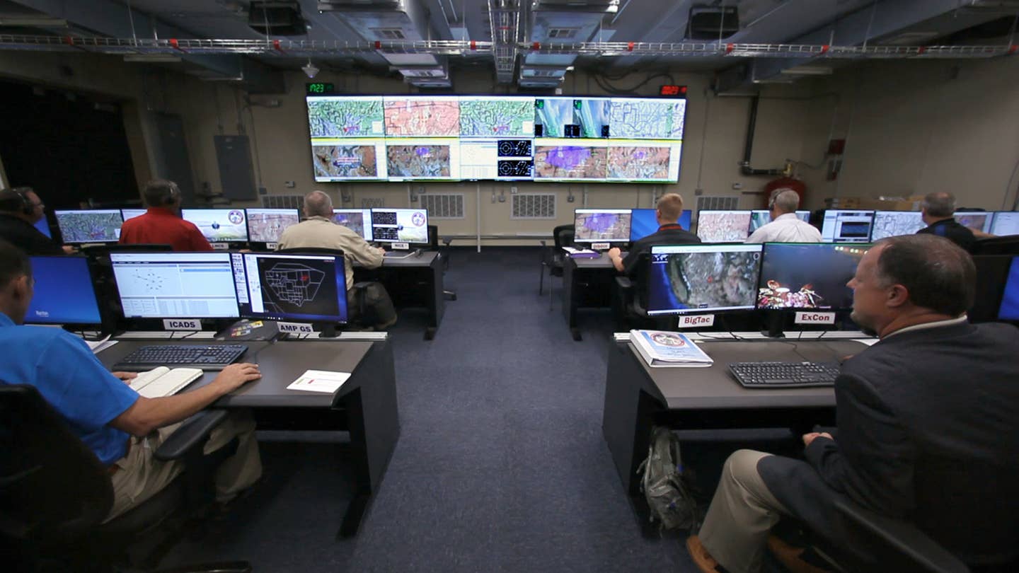 Part of the SLATE team in the operation center at Nellis Air Force Base, Nevada, during the Phase III capstone demonstration. <em>U.S. Air Force photo/William Graver</em>