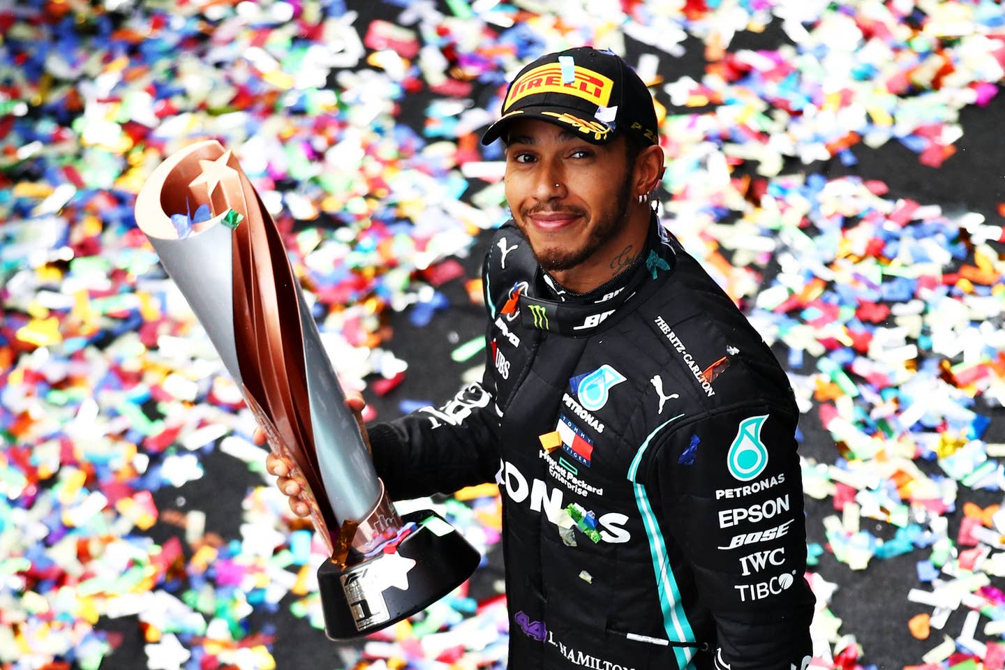 ISTANBUL, TURKEY - NOVEMBER 15: Race winner Lewis Hamilton of Great Britain and Mercedes GP celebrates winning a 7th F1 World Drivers Championship on the podium during the F1 Grand Prix of Turkey at Intercity Istanbul Park on November 15, 2020 in Istanbul, Turkey. (Photo by Bryn Lennon/Getty Images)