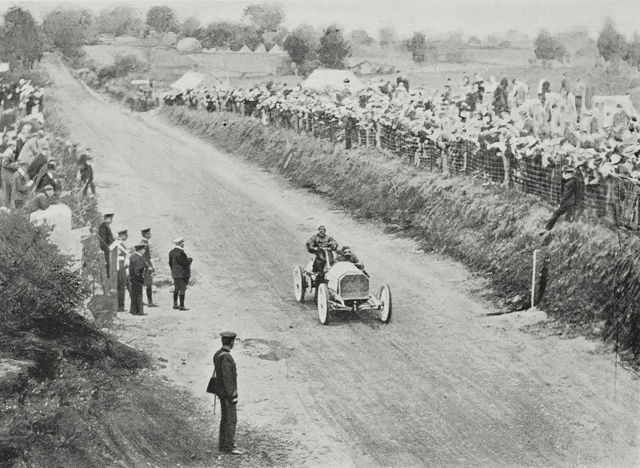 Camille Jenatzy driving a Mercedes, winner of the Gordon Bennett Cup, July 2, 1903, Ireland, photograph by Lafayette, from L'Illustrazione Italiana, Year XXX, No 28, July 12, 1903.