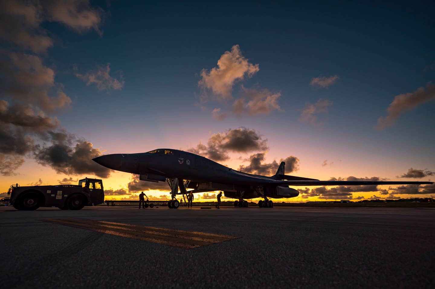 A B-1B is pushed into a parking spot at Andersen Air Force Base after supporting a Bomber Task Force integration mission in the Indo-Pacific region. <em>U.S. Air Force photo by Master Sgt. Nicholas Priest</em>