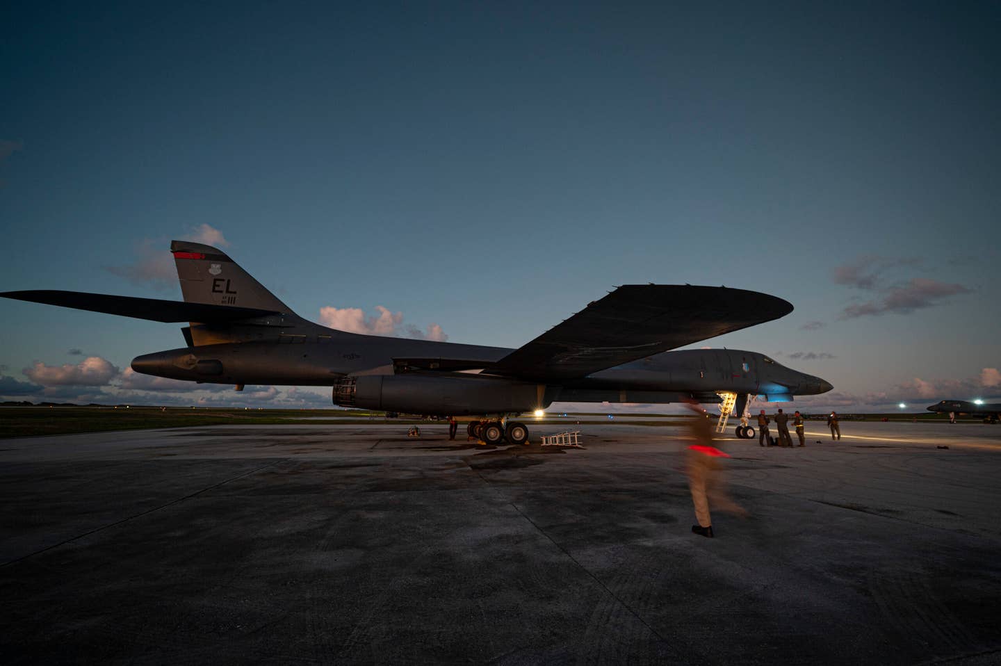 Aircrew assigned to the 34th Bomb Squadron, Ellsworth Air Force Base, discuss their B-1B mission upon returning from a Bomber Task Force integration mission in the Indo-Pacific region at Andersen Air Force Base, June 6, 2022. <em>U.S. Air Force photo by Master Sgt. Nicholas Priest</em>