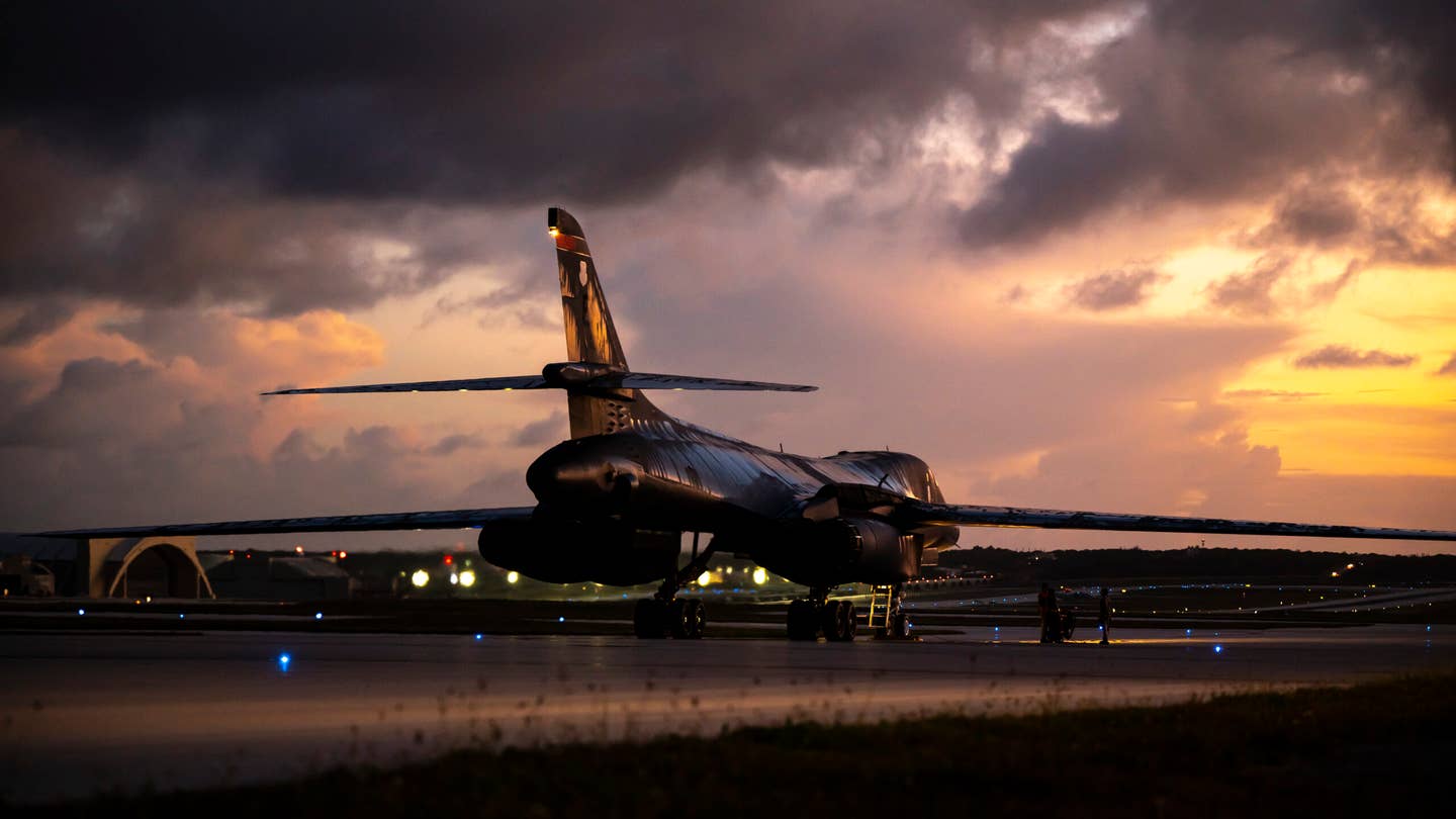 A B-1B waits to be guided into a parking spot after returning to Andersen Air Force Base, June 8, 2022. <em>U.S. Air Force photo by Master Sgt. Nicholas Priest</em>