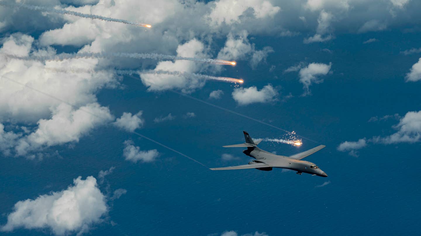 A B-1B deploys flares during a Bomber Task Force mission over the Pacific Ocean, June 25, 2022. <em>U.S. Air Force photo by Master Sgt. Nicholas Priest</em>