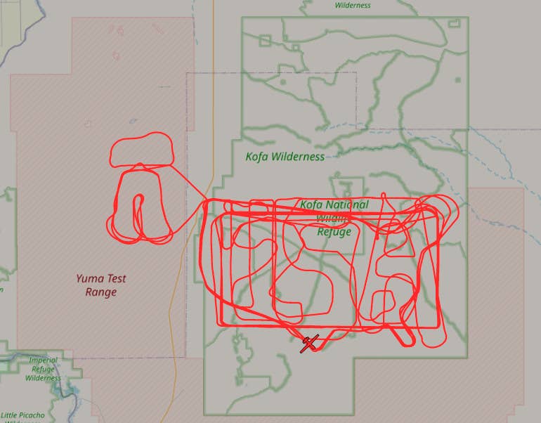 The Zephyr S's flight activity today. The number 26, the letters USA, and what appears to be the outline of the continental United States appear overlaid on top of each other in the airspace over the Kofa National Wildlife Refuge. What might be the pi symbol or a depiction of the Liberty Bell is seen over the adjacent Yuma Test Range. <em>ADS-B Exchange</em>