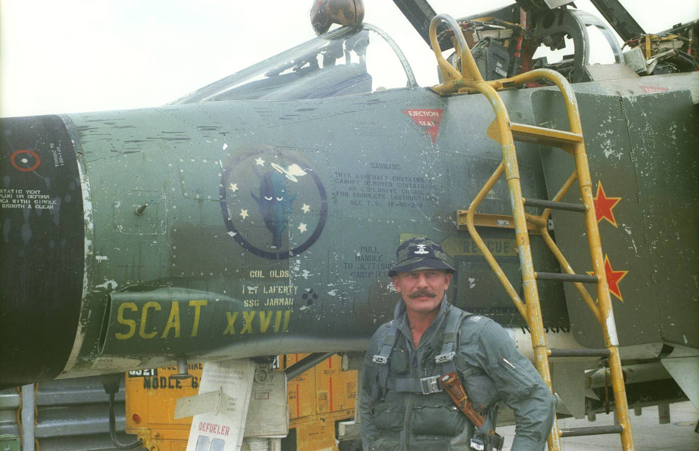 Col. Robin Olds at Ubon Royal Thai Air Force Base, Thailand, with his F-4C, named <em>SCAT XXVII</em>, named after his West Point roommate Scat Davis, who could not become a military pilot due to poor eyesight. This aircraft is now preserved at the National Museum of the U.S. Air Force. <em>U.S. Air Force photo</em><br><a href="https://www.nationalmuseum.af.mil/Visit/Museum-Exhibits/Fact-Sheets/Display/Article/196007/brig-gen-robin-olds-combat-leader-and-fighter-ace/undefined"></a>
