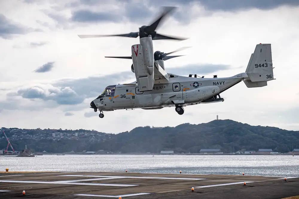 A CMV-22B Osprey tiltrotor aircraft assigned to the "Titans" of Fleet Logistics Multi-Mission Squadron (VRM) 30, prepares to land at Commander, Fleet Activities Sasebo (CFAS) while conducting passenger and cargo transfer operations. U.S. Navy photo by Mass Communication Specialist 1st Class Jeremy Graham)