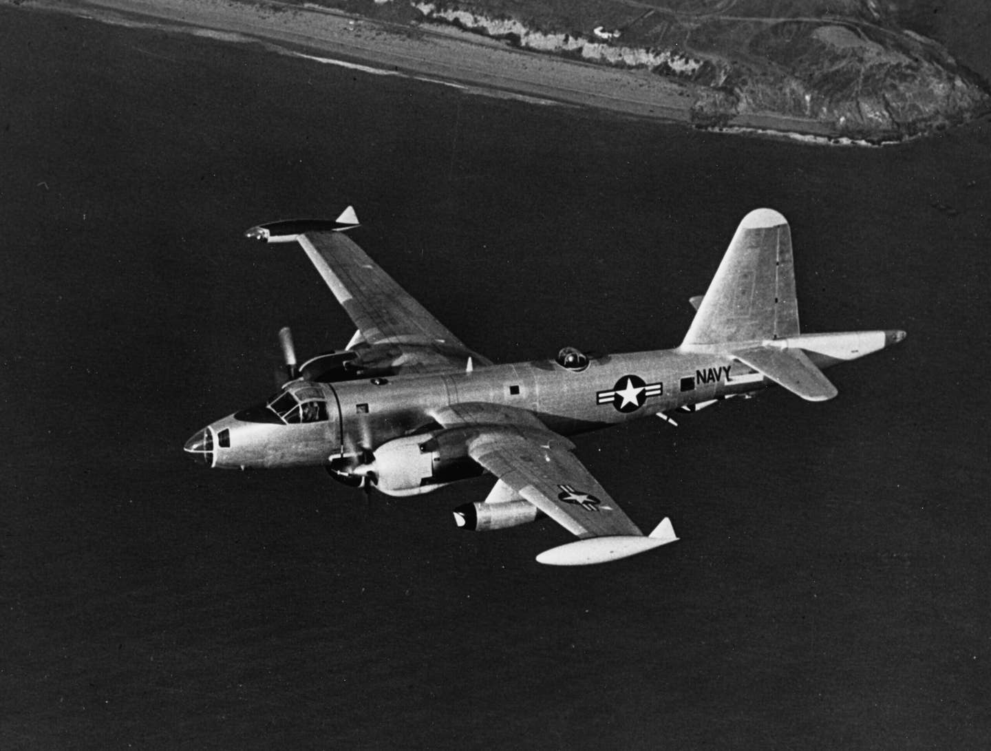 An early P2V-7&nbsp;Neptune&nbsp;delivered in natural metal finish. Note the two auxiliary J34 turbojets hanging from the outboard wings, which were used for takeoff, climb, and landing. <em>U.S. Navy</em>