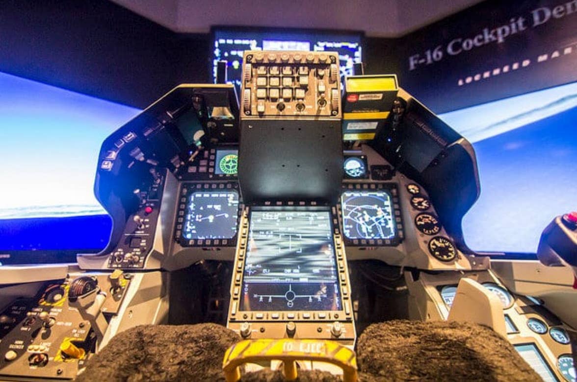 An F-16 cockpit mockup showing the improved Elbit Systems center display installed. <em>Lockheed Martin</em>
