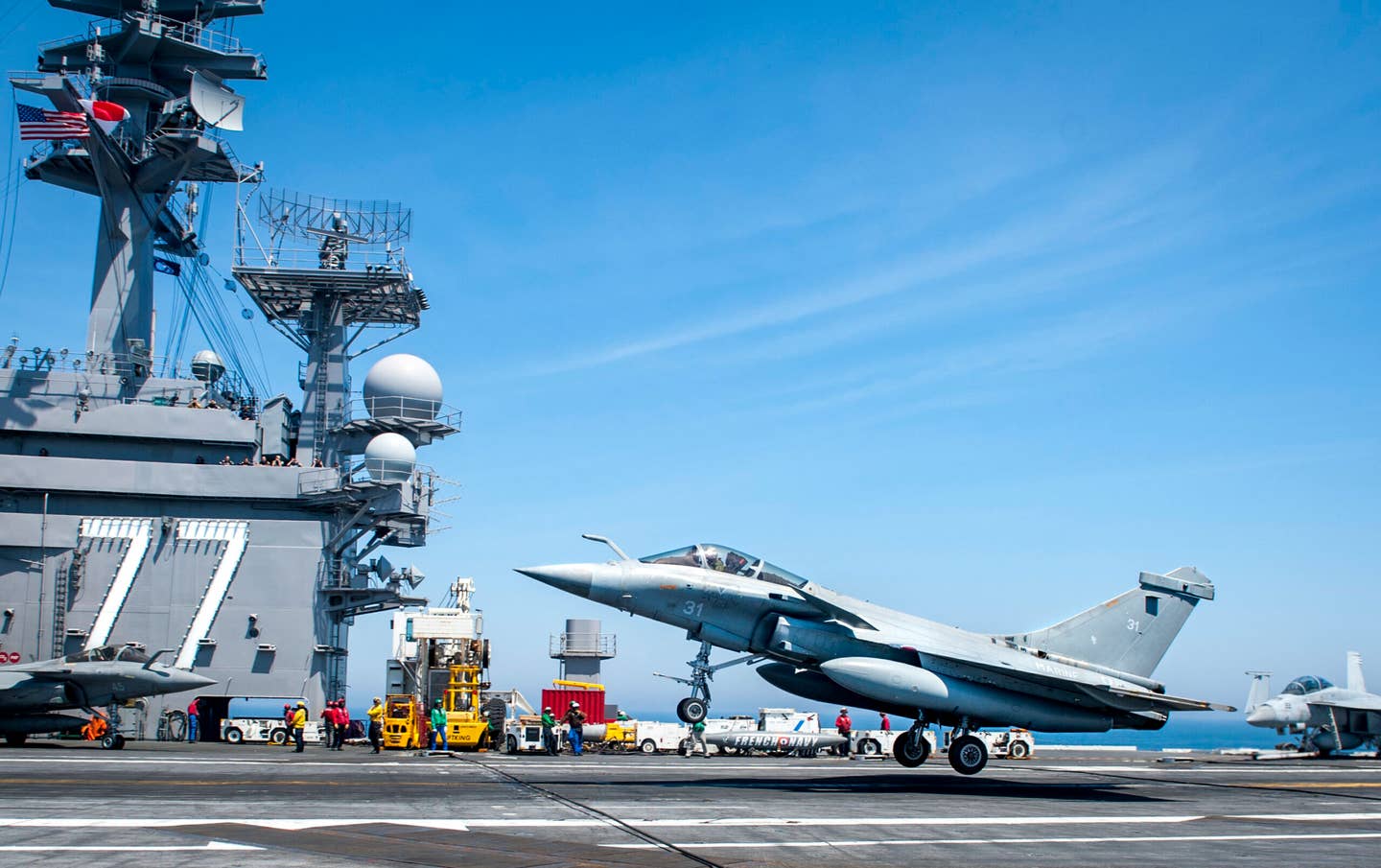 A Rafale M of the French navy lands during flight operations aboard the aircraft carrier USS <em>George H.W. Bush</em>. <em>Mass Communication Specialist 3rd Class Brooke Macchietto/U.S. Navy</em>