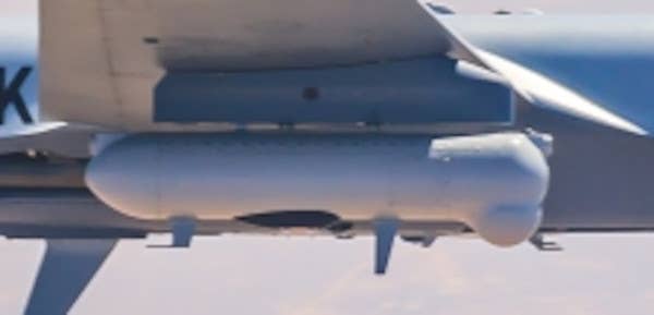 A REAP pod under the wing of an MQ-9. <em>General Atomics</em>