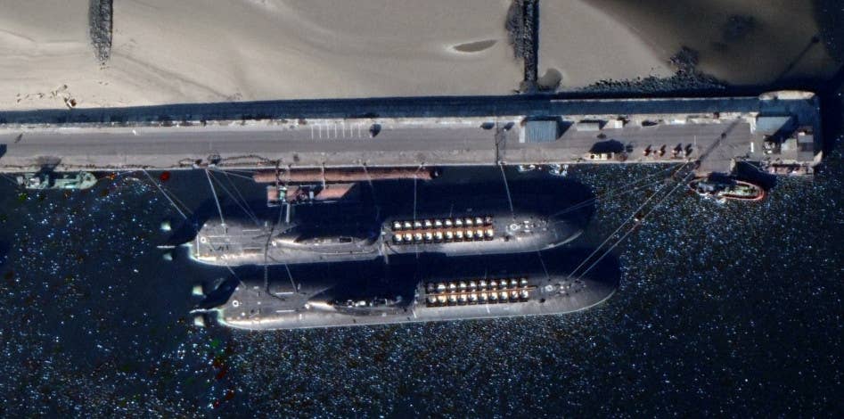 A satellite image taken in September 2021 that shows TK-17 and TK-20 tied to a pier at the Russian Navy's base at Severodvinsk. The covers to their missile tubes have been notably removed, likely to ensure that the U.S. government can use spy satellites to routinely verify they are not armed as part of various arms control agreements. <em>Google Earth</em>