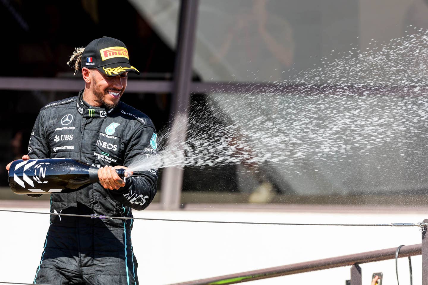Lewis Hamilton celebrates a hard fought second place finish | (Photo by Peter Fox/Getty Images)