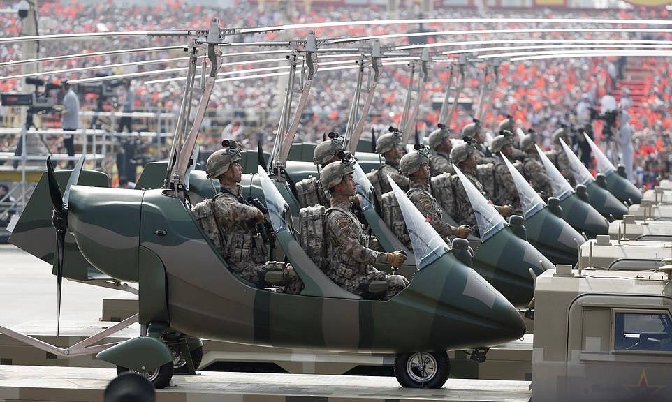 Unarmed Chinese gyrocopters on display at the 70th-anniversary military parade in Beijing, October 1, 2019. <em>Source: AP.</em>