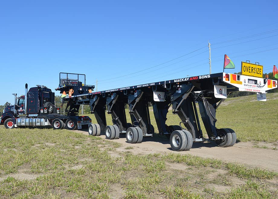 A TRT quad-axle house-moving trailer at full extension. <em>TRT</em>