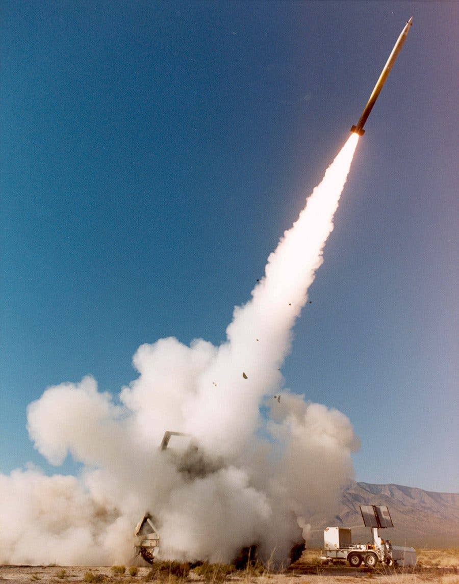 A Lockheed Martin Guided Multiple Launch Rocket System rocket being fired from a HIMARS. (Lockheed Martin photo)
