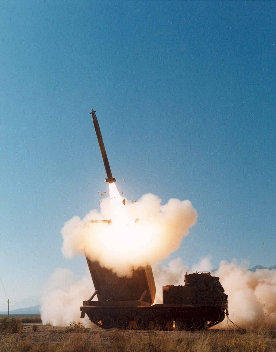 A Lockheed Martin Guided Multiple Launch Rocket System munition being fired from a M270 MLRS. (Lockheed Martin photo)