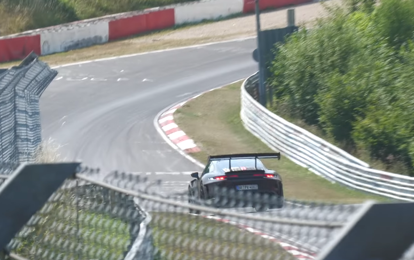 2023 Porsche 911 GT3 RS catching a tiny bit of air