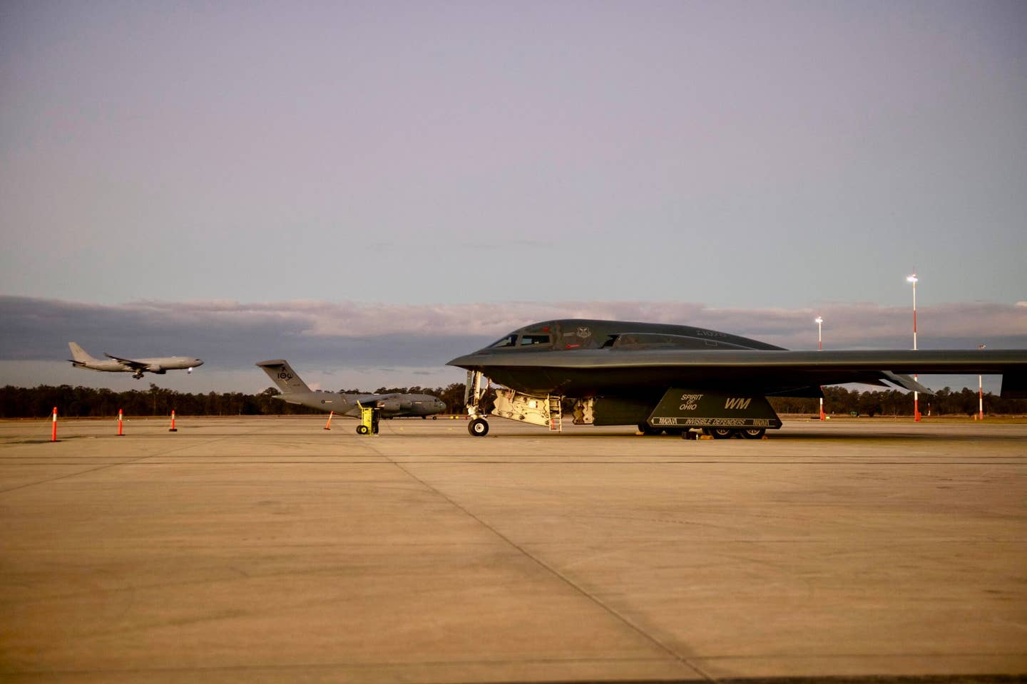 A USAF B-2 Spirit stealth bomber parked on the tarmac at Amberley airbase in Queensland, Australia. <em>USAF photo.</em>