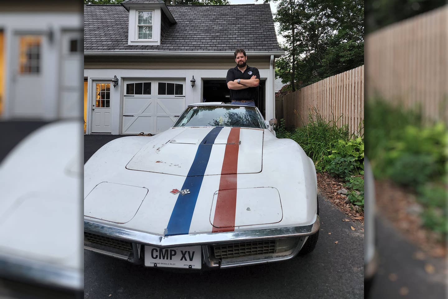 Max Kaiserman stands in the driver's seat of the ultra-rare C3 Corvette.