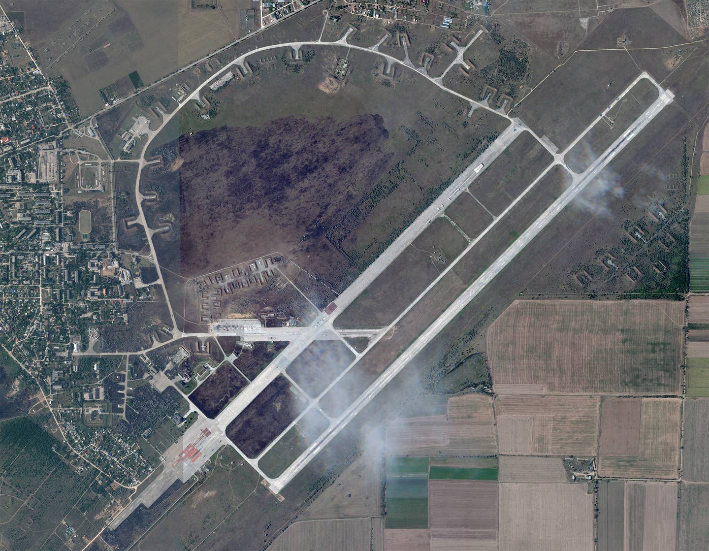 A satellite image of Saki Air Base taken on August 10, 2022, the day after a series of explosions ripped through the base. <em>PHOTO © 2022 PLANET LABS INC. ALL RIGHTS RESERVED. REPRINTED BY PERMISSION</em>