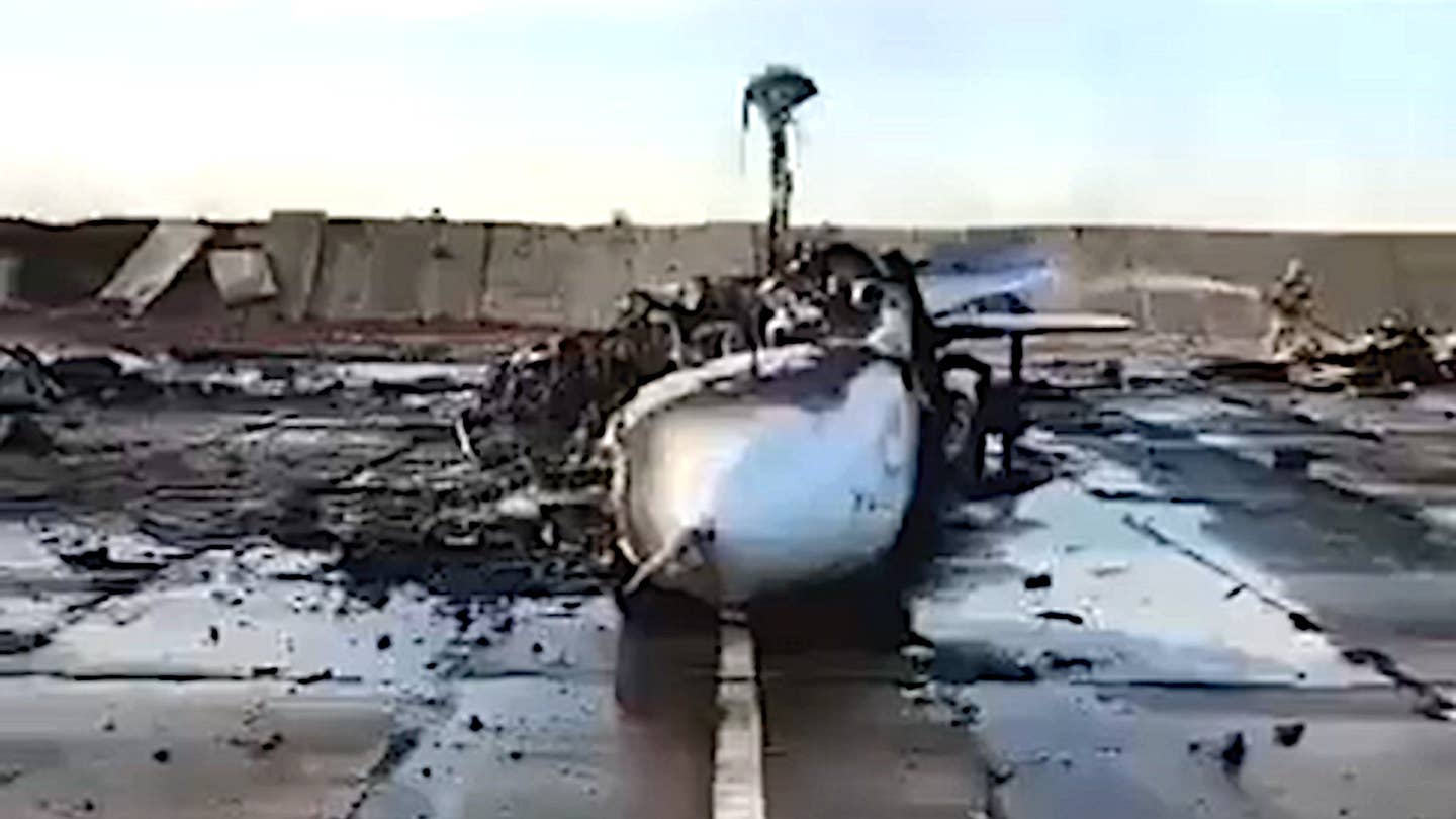 The remains of a Russian Su-24M Fencer combat jet at Saki Air Base following a series of explosions there on Aug. 9, 2022.