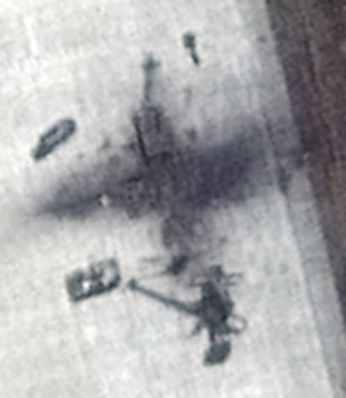 A closer look at the activity seen around the scorched area on the runway at Ziabrovka Airbase that is visible in the August 12 satellite image from Maxar. <em>Maxar Technologies</em>