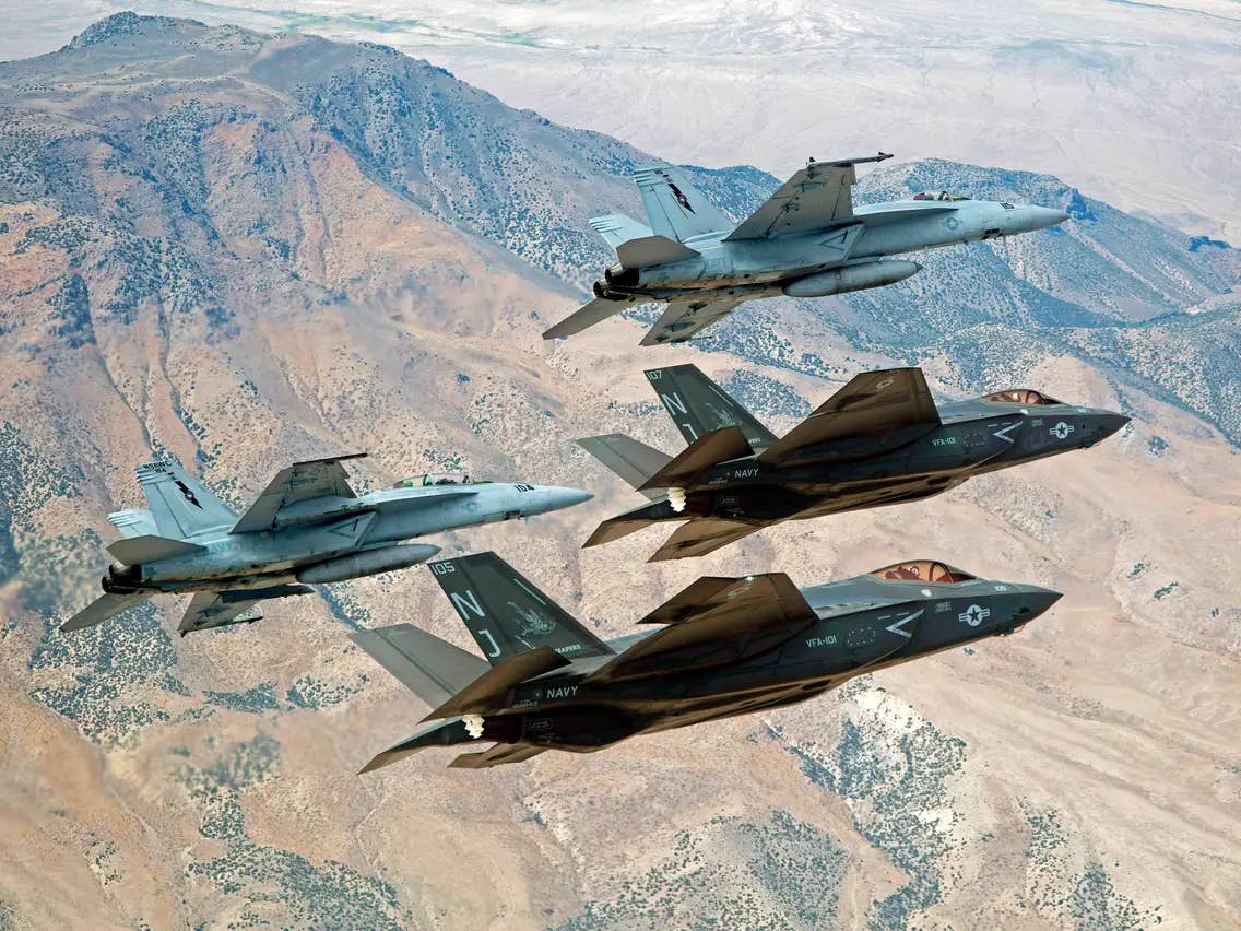 Super Hornets and F-35Cs, 4th gen and 5th gen, flying together. (US Navy image)