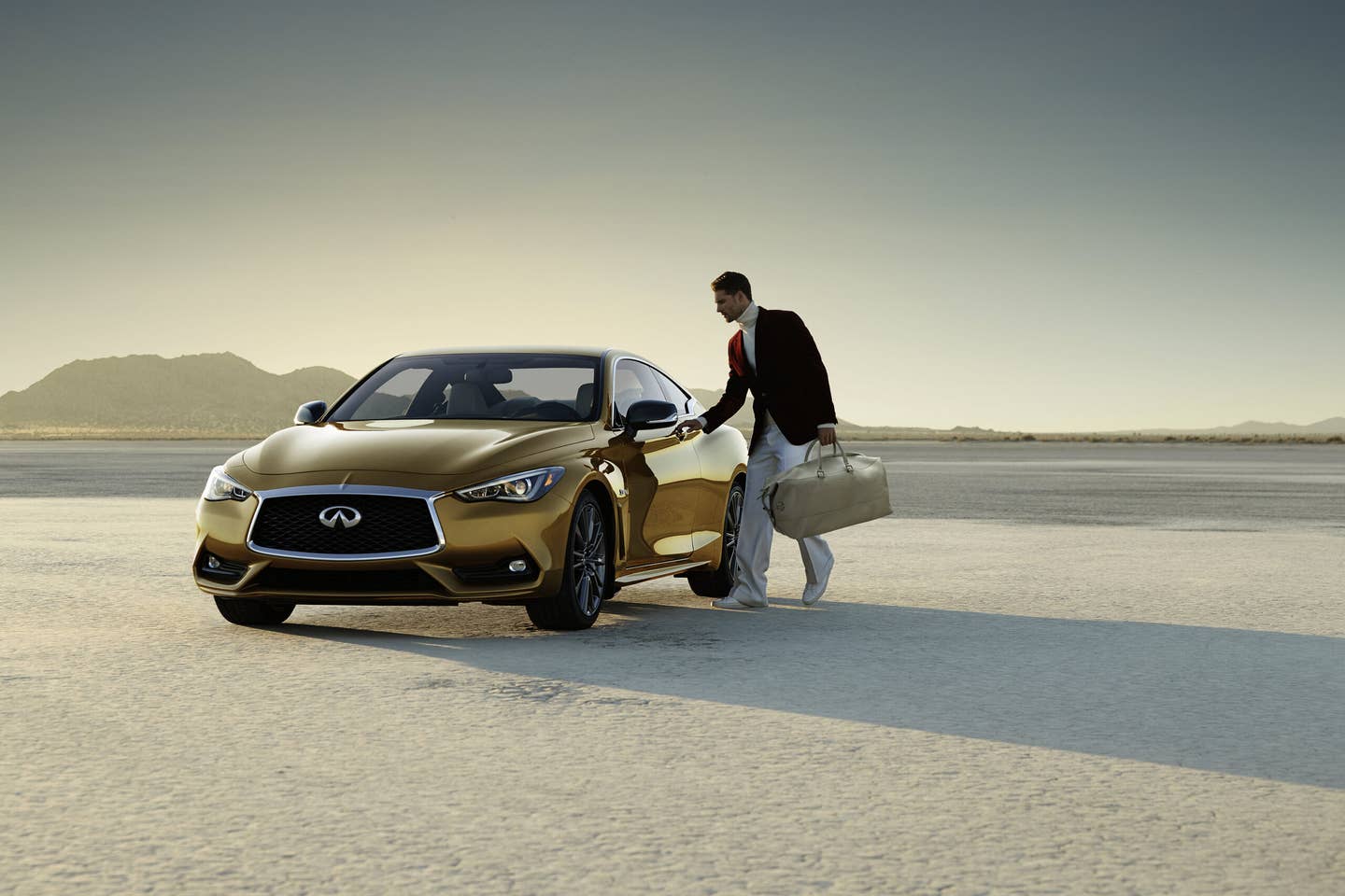 Based on the Red Sport 400 version of the all-new 2017 INFINITI Q60, the 400-horsepower INFINITI Q60 Neiman Marcus Limited Edition is equipped with a 3.0 liter-twin-turbocharged V6 engine and is painted a striking Solar Mica hue. The Nieman Marcus Limited Edition Q60 offers Direct Adaptive Steering™, Dynamic Digital Suspension, Bose® Performance Series premium audio system and INFINITI InTouch™ infotainment system. This special edition Q60 also features genuine carbon fiber accents on the fender vents, fog-light finishers, mirror caps and rear spoiler.  The interior is equipped with Gallery White leather-appointed sports seats and Silver Optic Fiber Interior Trim.