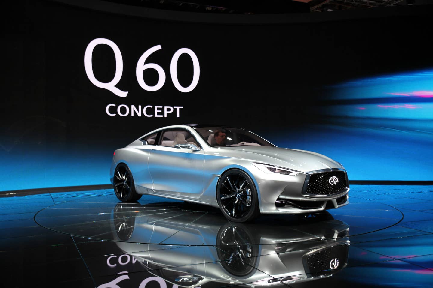 Detroit/Hong Kong - At 8:05am on Tuesday in Detroit at the 26th annual North American International Auto Show, Infiniti officially unveiled its Q60 Concept sports coupe for the global media. Introducing the important 2+2 design was new President of Infiniti Motor Company Ltd., Roland Krüger. Following the drive-on reveal of the Q60 Concept in Cobo Hall, it was confirmed that the sleek design foreshadows the production version of a third-generation coupe due out during calendar-year 2016.