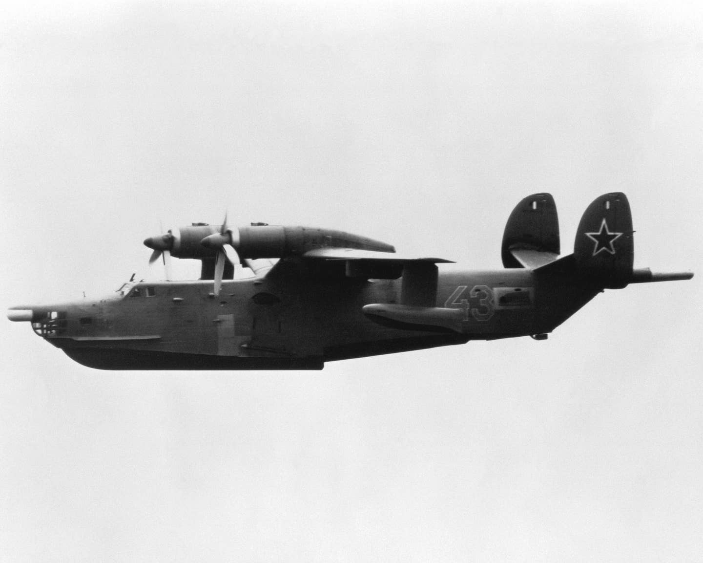 A Cold War-era air-to-air view of a Soviet Navy Be-12 photographed from an intercepting NATO aircraft. <em>U.S. Department of Defense</em>
