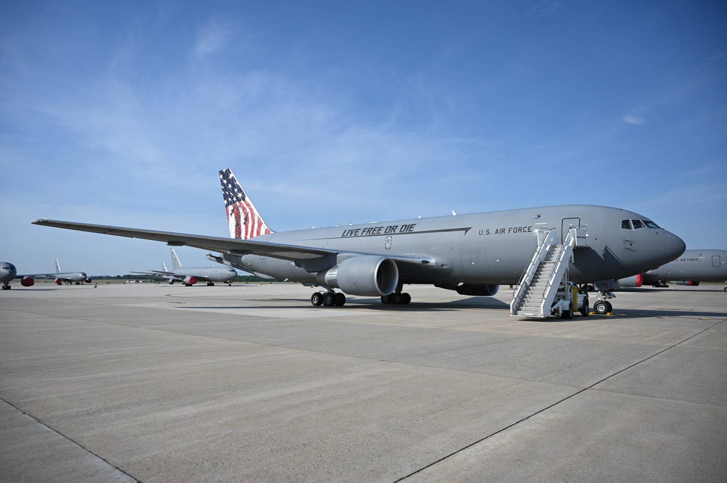A KC-46A Pegasus, dubbed the Spirit of Portsmouth and emblazoned with a colorful new paint job, touches down at Pease Air National Guard Base New Hampshire, July 1, 2022. <em>Credit: Staff Sgt. Victoria Nelson/U.S. Air National Guard</em>
