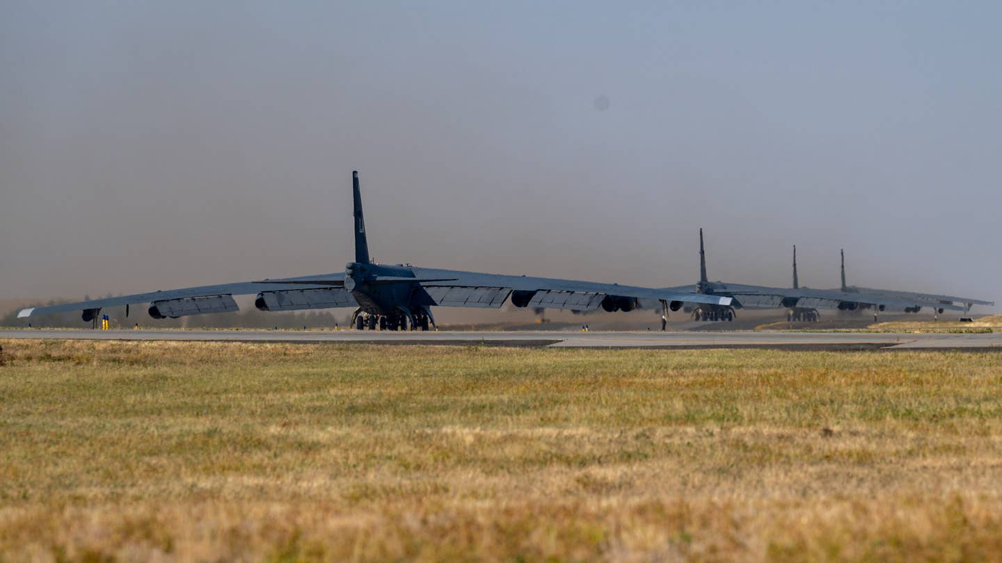 Four B-52H Stratofortresses taxi down the runway during an Agile Combat Employment exercise at Fairchild Air Force Base. <em>Credit: Senior Airman Chase Sullivan/U.S. Air Force</em>