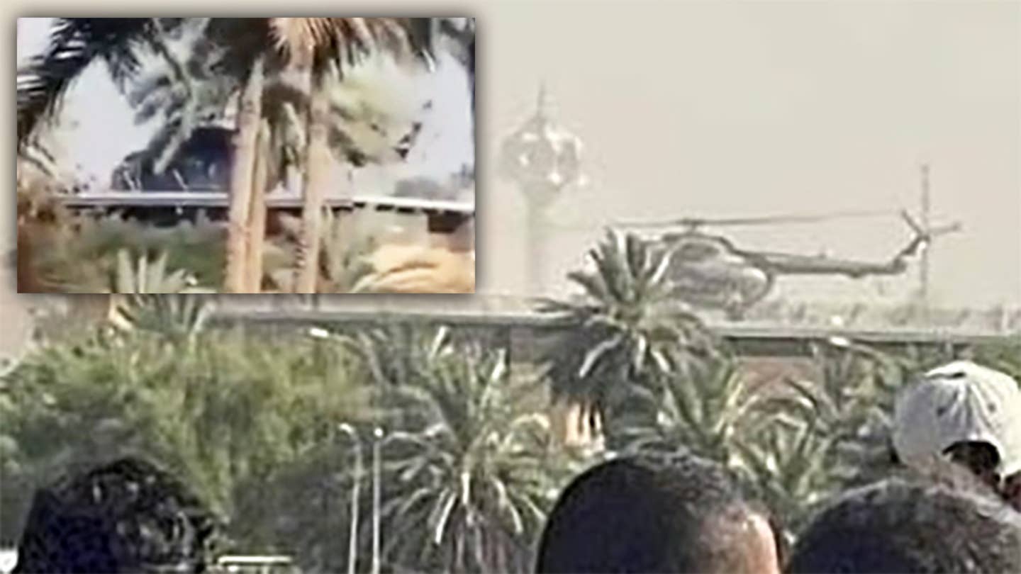 A picture and a still from a video reportedly showing an Mi-8/Mi-17 helicopter on the roof of a building in the Green Zone in Iraq's capital Baghdad, which triggered false claims that America's Embassy there was being evacuated.