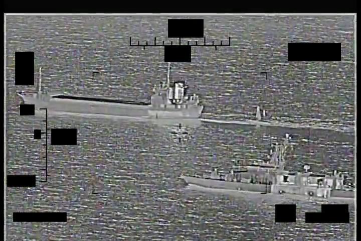 Screenshot of a video showing support ship Shahid Baziar, left, from Iran's Islamic Revolutionary Guard Corps Navy unlawfully towing a Saildrone Explorer unmanned surface vessel. <em>Credit: U.S. Navy</em>