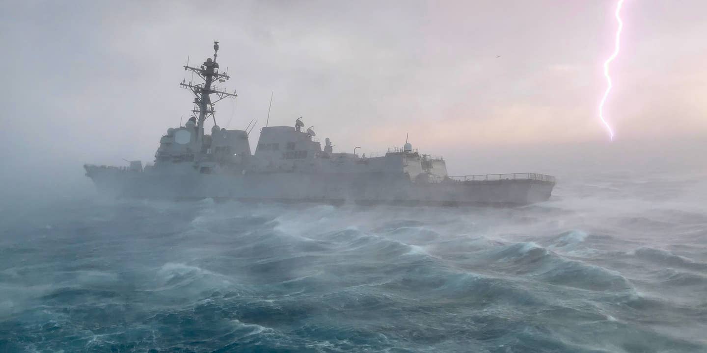 Striking Image Of USS Bainbridge Sailing Through A Lightning Storm