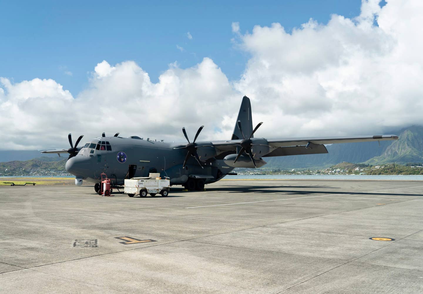 An AC-130J Ghostrider gunship with the new 105mm howitzer from the 17th Special Operations Squadron at Kaneohe Bay, Hawaii, on August 17, 2022. <em>USAF</em>