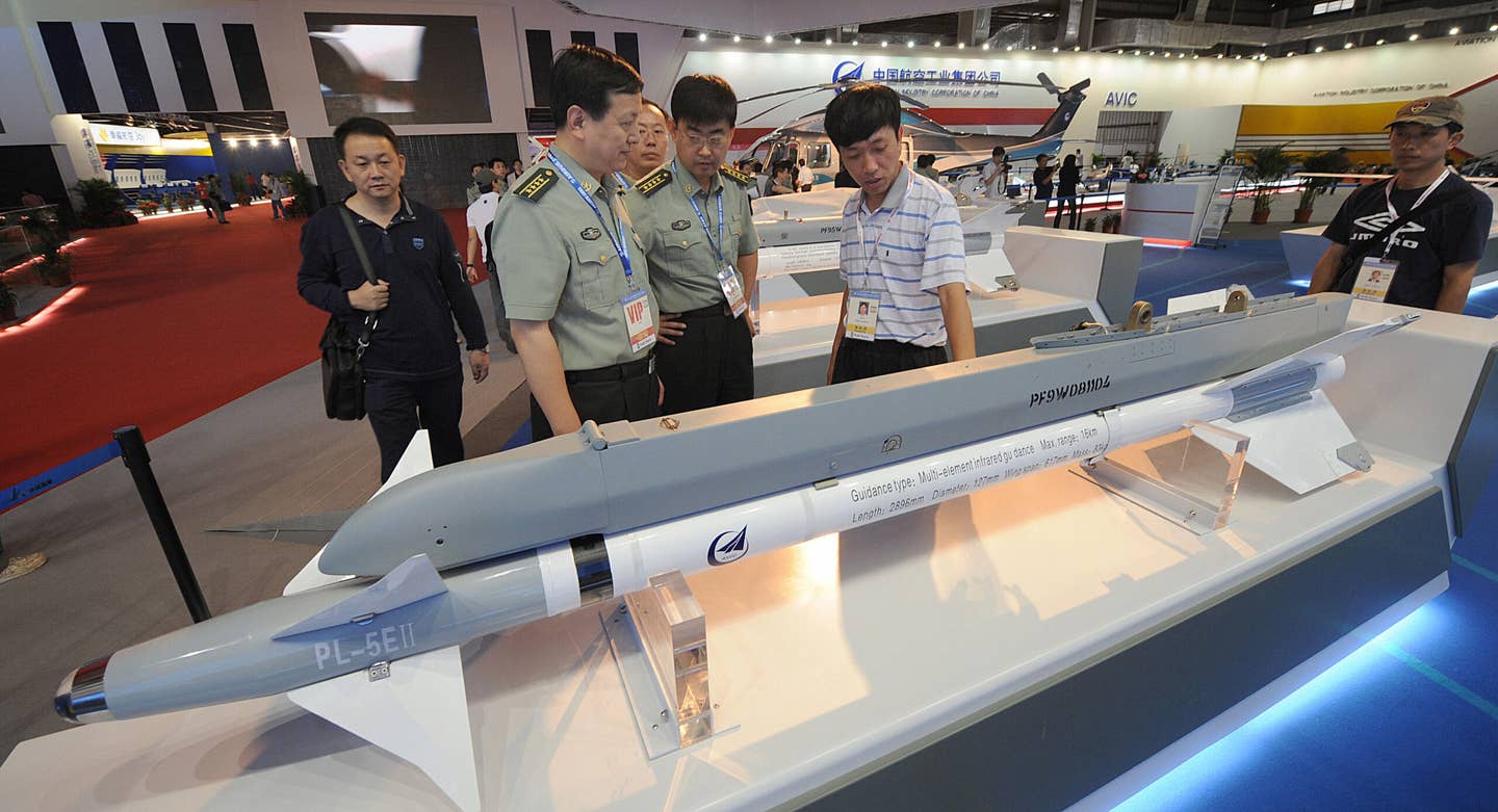 A mock-up of a PL-5E-II at the China Airshow at Zhuhai in 2008. Externally, the weapon is very similar to the AIM-9L/M Sidewinder. <em>MIKE CLARKE/AFP via Getty Images</em>